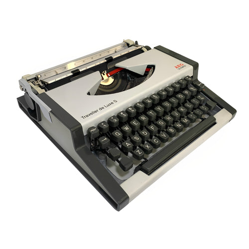 White Olympia Traveller de Luxe S Typewriter